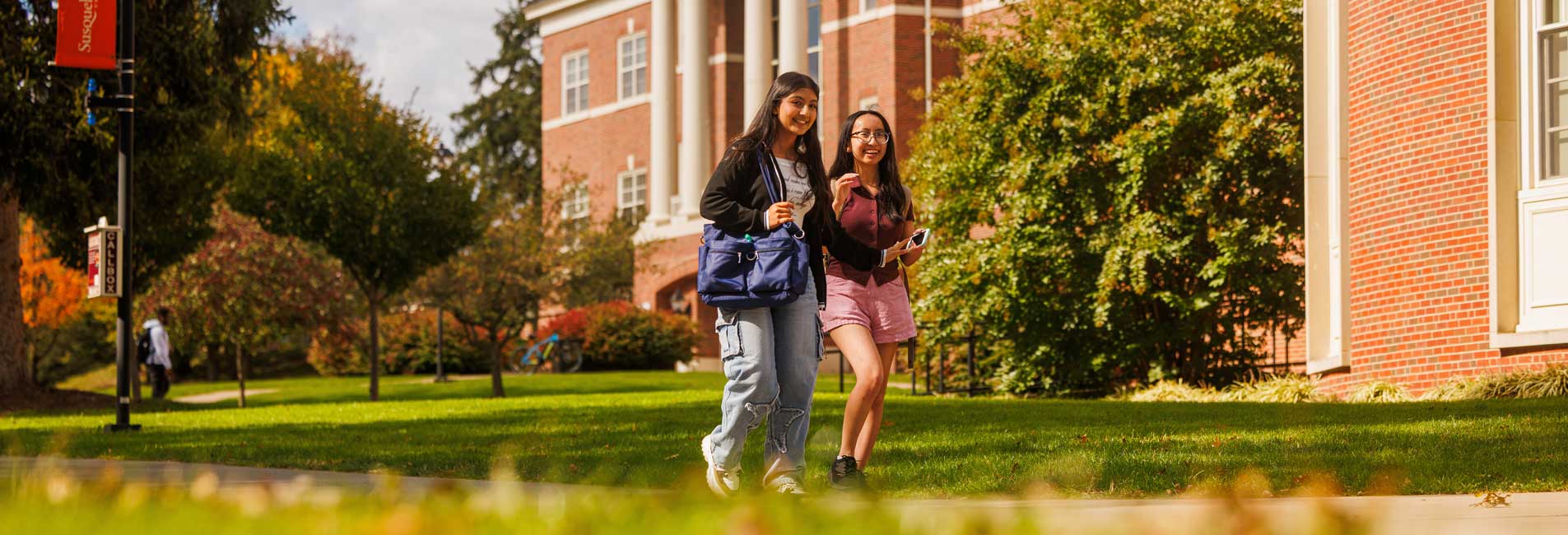 students walking on campus
