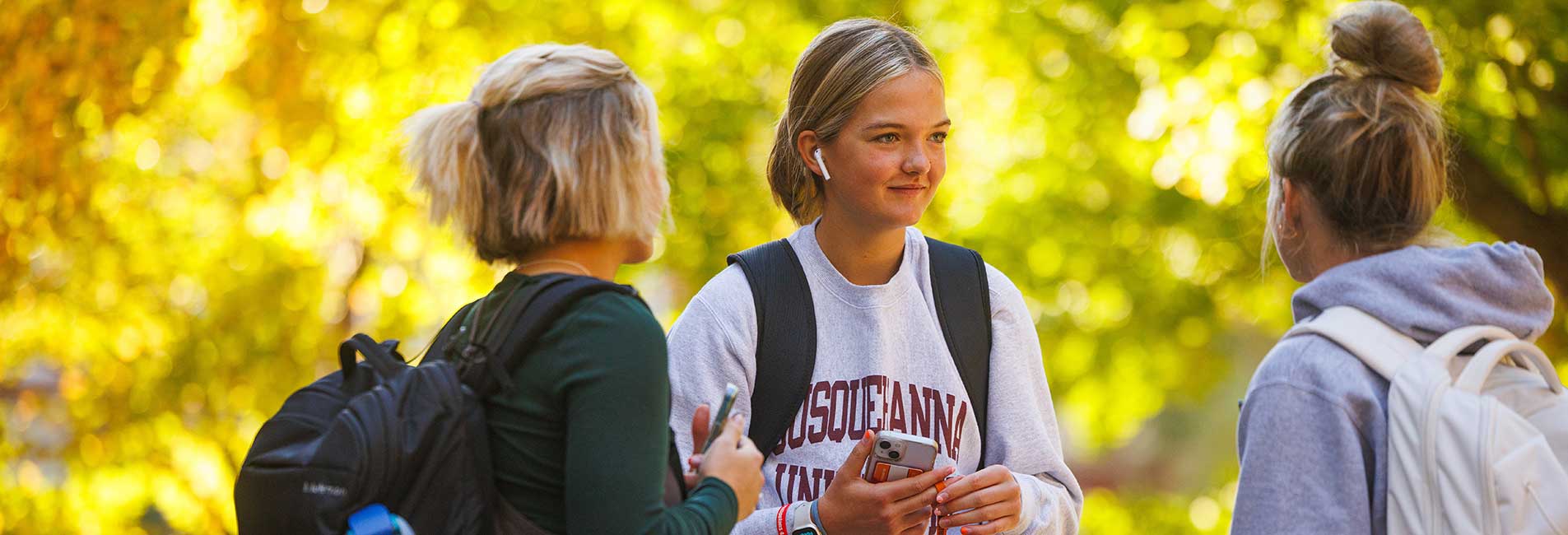 students outside on campus
