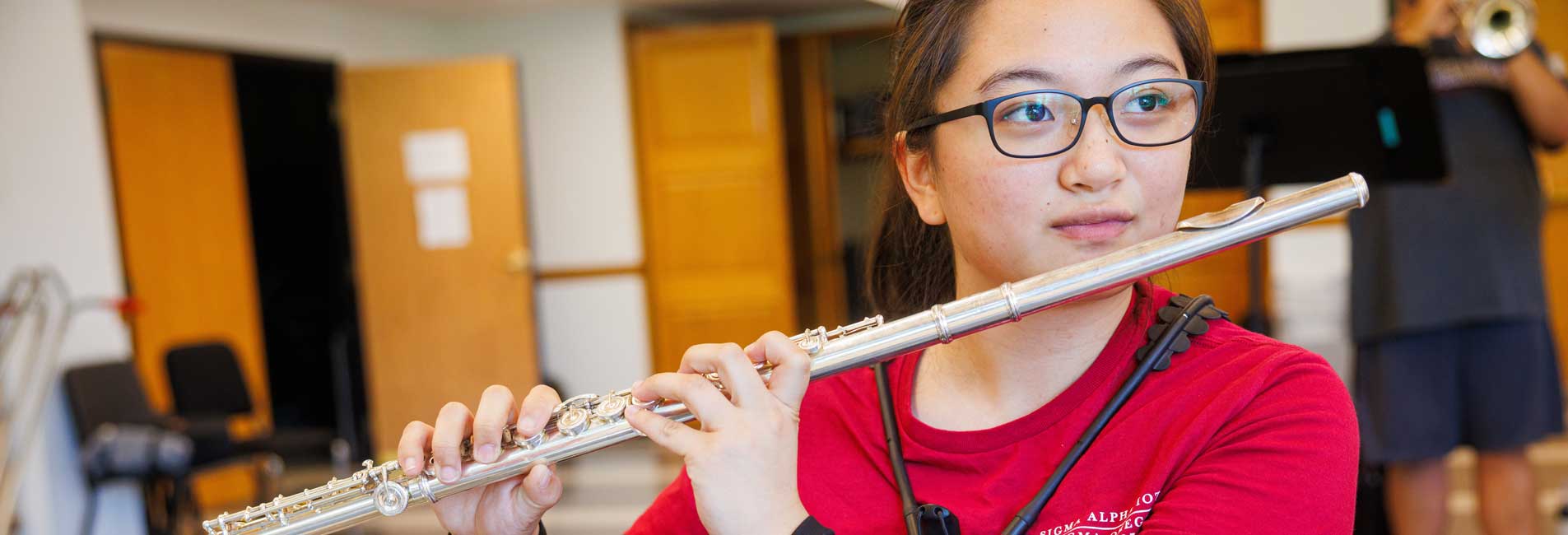 student playing a musical instrument