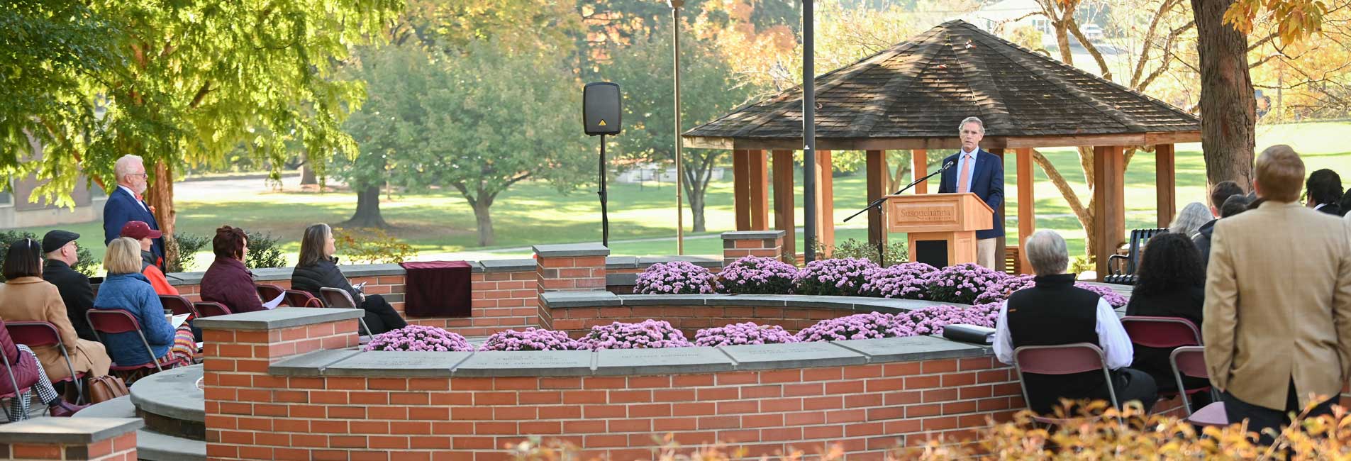 presentation, speaker outside for alumni