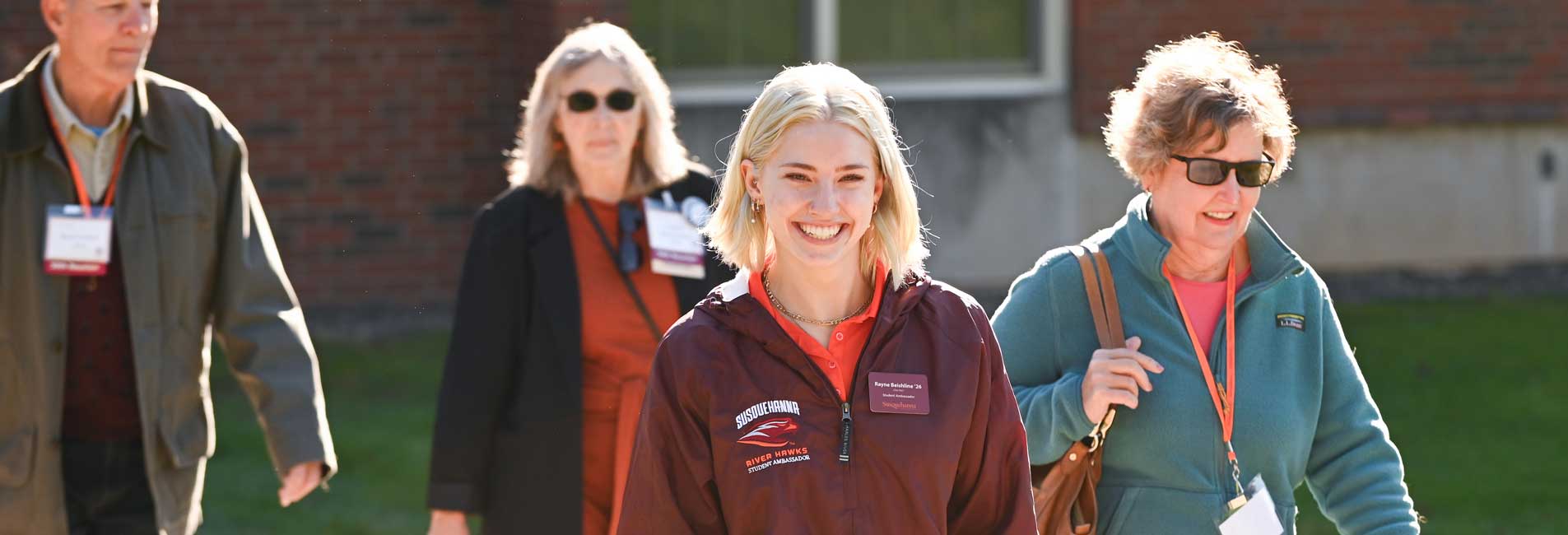 people walking on campus