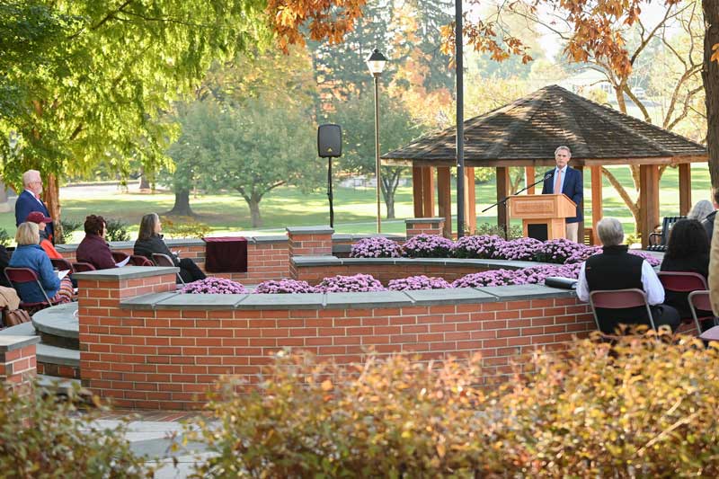 presentation, speaker outside for alumni