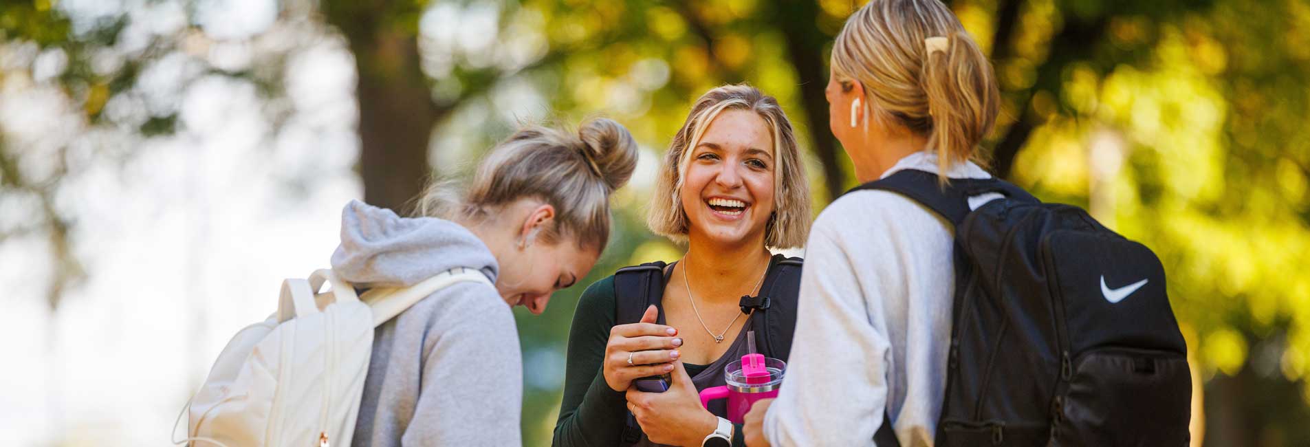 students talking outside